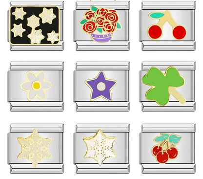 Glaze Charms: Flower, Star, Snowflake & Cherry – overview of enamel charms: gold snowflakes on black, red roses in a vase, cherries, daisy flower, purple star, four-leaf clover, and snowflake charms, Italian charm bracelet charms by Charmtastic
