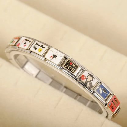 Graduate Makeup Anniversary Panda Dog Dress Charms – Italian charm bracelet displayed on jewelry stand showing assorted word and icon enamel charm links, Italian charm bracelet by Charmtastic