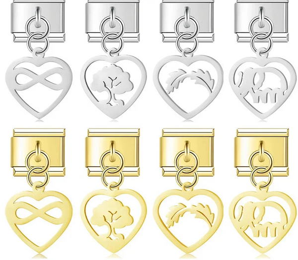 A collection of 9mm Italian charms featuring open-wire heart dangles with internal cutouts of an infinity symbol, tree of life, leaf branch, and elephant. Available in silver and gold finishes