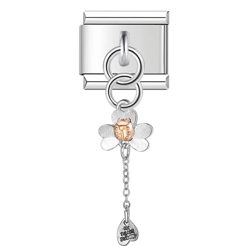 Daisy with dangling ladybug Italian charm, by Charmtastic