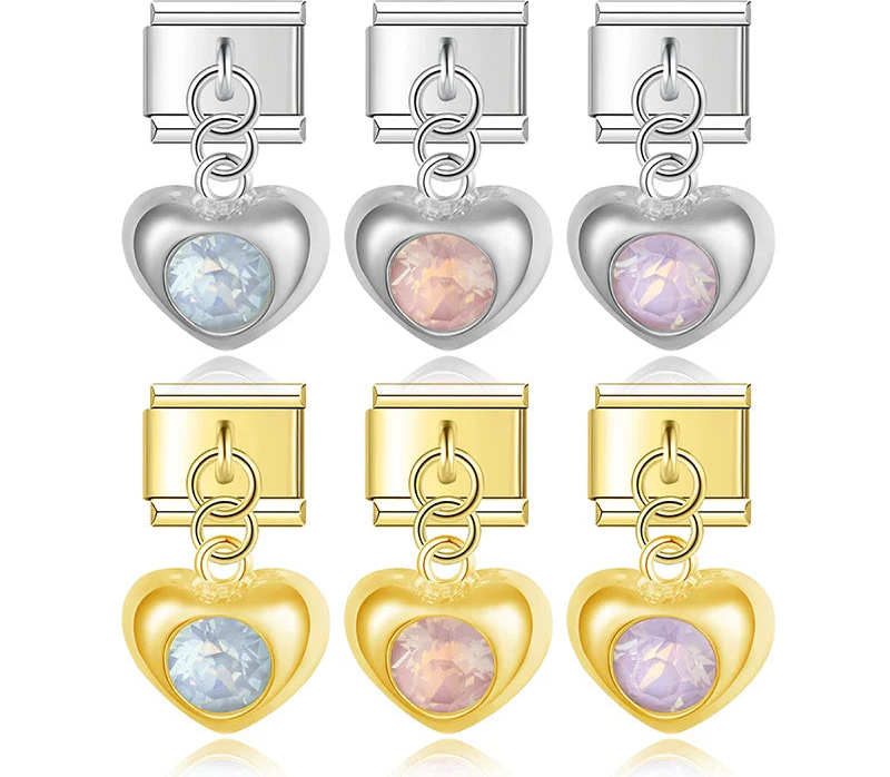A collection of 6 dangle Italian charms on silver and gold 9mm modular links featuring puffed metal hearts with large round crystal centers in iridescent, pink, and lavender - Charmtastic