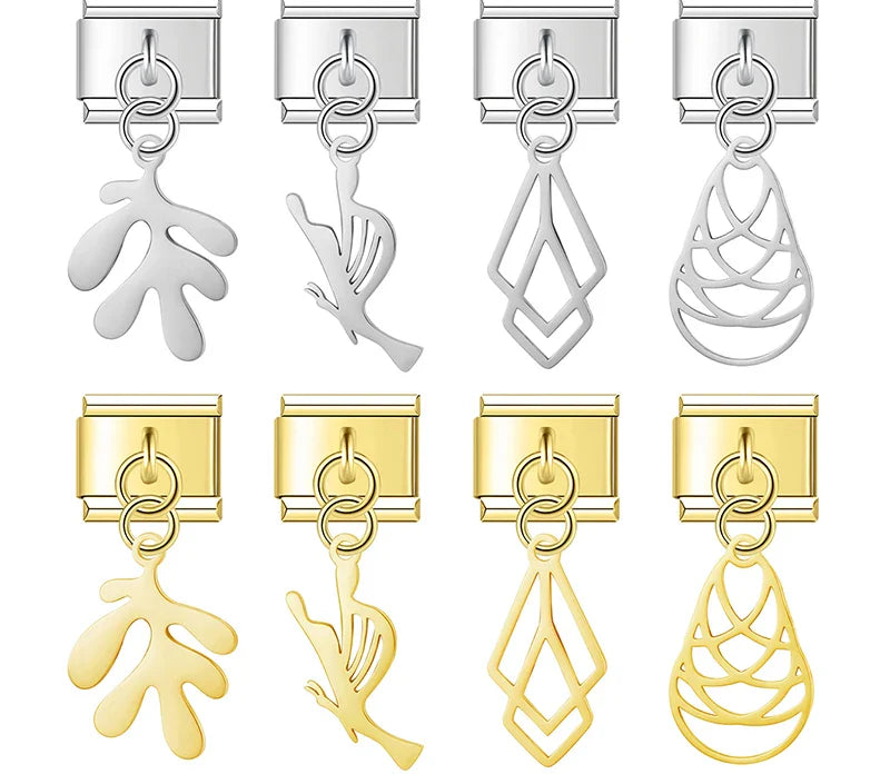 A collection of 8 silver and gold dangle Italian charms on 9mm modular links featuring modern art silhouettes including an abstract leaf, bird, geometric diamond, and woven teardrop - Charmtastic