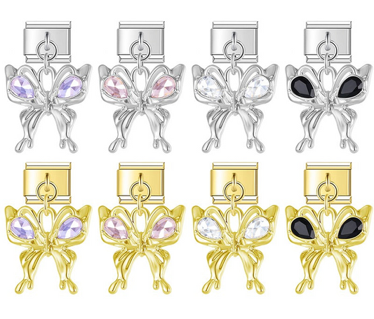 A 9mm Italian charm featuring a trendy, liquid-metal butterfly dangle accented with teardrop crystals. Available on silver and gold bases with purple, pink, clear, and black gems.