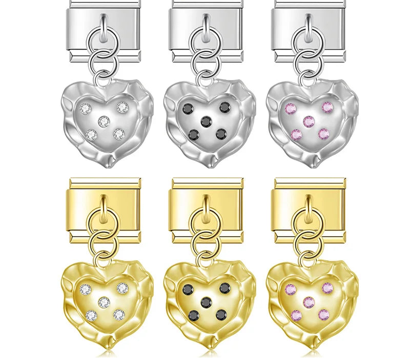 9mm Italian charm bracelet links featuring silver and gold wavy molten heart dangles embedded with clear, black, and pink crystals.