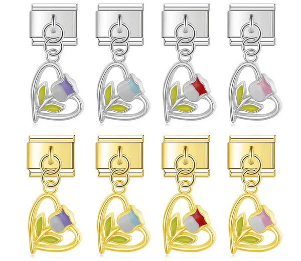 A 9mm Italian charm featuring a delicate open wire heart dangle with an enamel tulip inside. Available on silver and gold bases with purple, blue, red, and pink flowers.