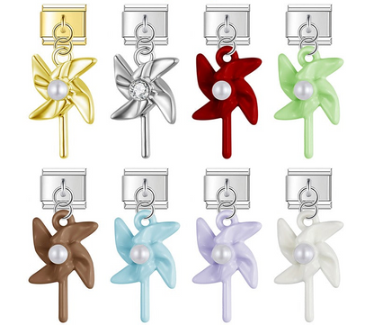 A 9mm Italian charm featuring a pinwheel dangle. Available in solid gold, solid silver with a crystal center, and glossy enamel colors including red, green, brown, blue, purple, and white with pearl centers.