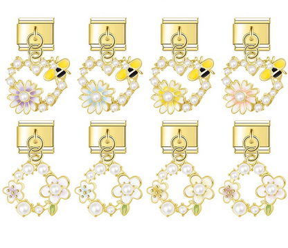 9mm gold Italian charm bracelet links featuring pearl-lined open hearts with bumblebees and daisies, plus pearl floral wreath dangles.