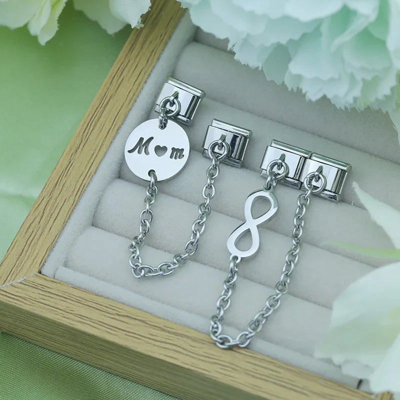 pendant chain silver – Mom disc and infinity safety chain charms displayed in a gift box, Italian charm bracelet lifestyle photo by Charmtastic