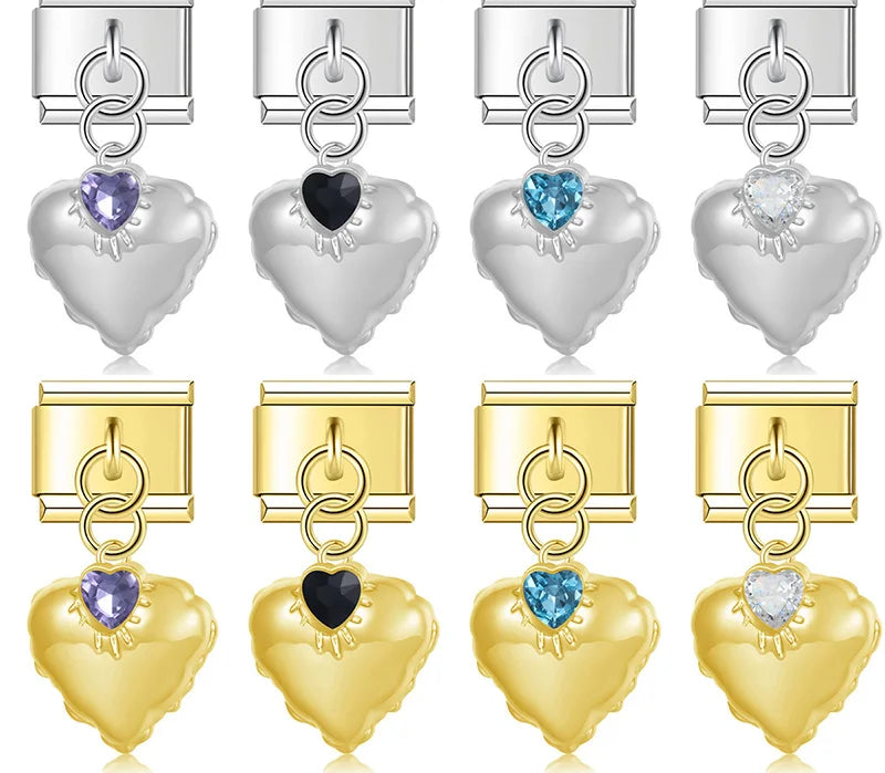 A collection of 8 dangle Italian charms on silver and gold 9mm modular links featuring puffed metal hearts with a small starburst crystal detail in purple, black, blue, and clear - Charmtastic
