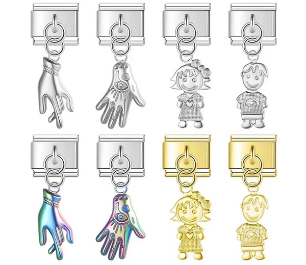 A collection of 9mm Italian charms featuring sculpted metal dangles. Includes boy and girl figures in silver and gold, and crossed fingers and mystic hands in silver and iridescent finishes.