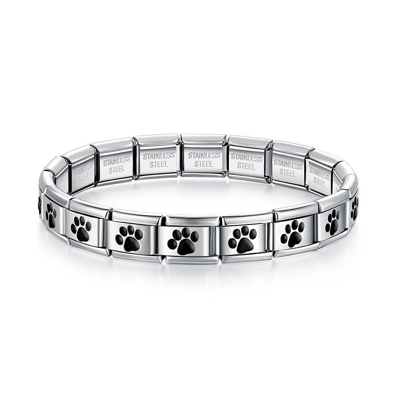 Silver charms bracelet with Black designs – second view of black enamel paw print Italian charm bracelet, by Charmtastic