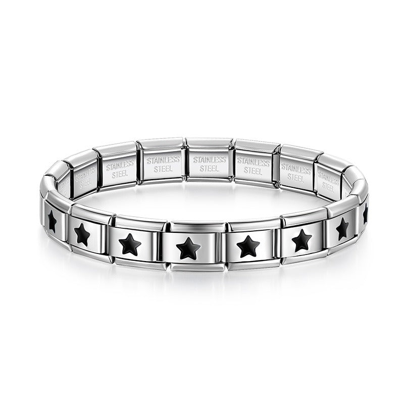Silver charms bracelet with Black designs – second view of black enamel star cutout Italian charm bracelet, by Charmtastic