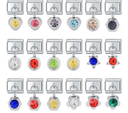 A collection of silver dangle Italian charms on 9mm modular links featuring hearts, stars, rounds, hexagons, and flowers with colorful crystal centers - Charmtastic