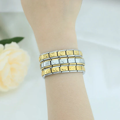 silver with gold charms bracelet Star Heart Flower – heart pattern Italian charm bracelets worn on wrist, by Charmtastic