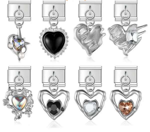A collection of 9mm silver Italian charms featuring textured heart dangles. Includes wavy open wire hearts with faceted crystals, a sculpted Mum heart, and intricate floral frames with iridescent stones