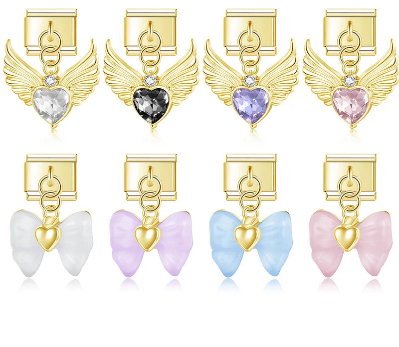 gold Italian charm bracelet links featuring angel wings with heart crystals and translucent resin bows with golden heart centers.